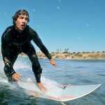 Adam Scott surfing