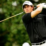 Adam Scott posing after a golf shot