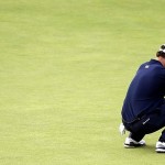 Adam Scott collapses after missing a putt at The Open Championship at Royal Lytham