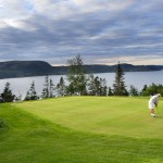 A putting green overlooking the waters at The View Golf Resort, Newfoundland.