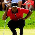 Tiger Woods eyes a putt at the WGC-Bridgestone Invitational