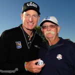 Jim Furyk and his caddie, Fluff, after shooting a round of 59 at the BMW Championship at Conway Farms Golf Club