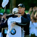 Jim Furyk and his caddie, Fluff, after shooting a round of 59 at the BMW Championship at Conway Farms Golf Club