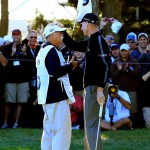 Jim Furyk and his caddie, Fluff, after shooting a round of 59 at the BMW Championship at Conway Farms Golf Club