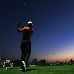 Tiger Woods playing golf at night