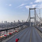 Tiger Woods in Turkey hitting a shot across the Bosphorus Bridge, which connects Europe and Asia